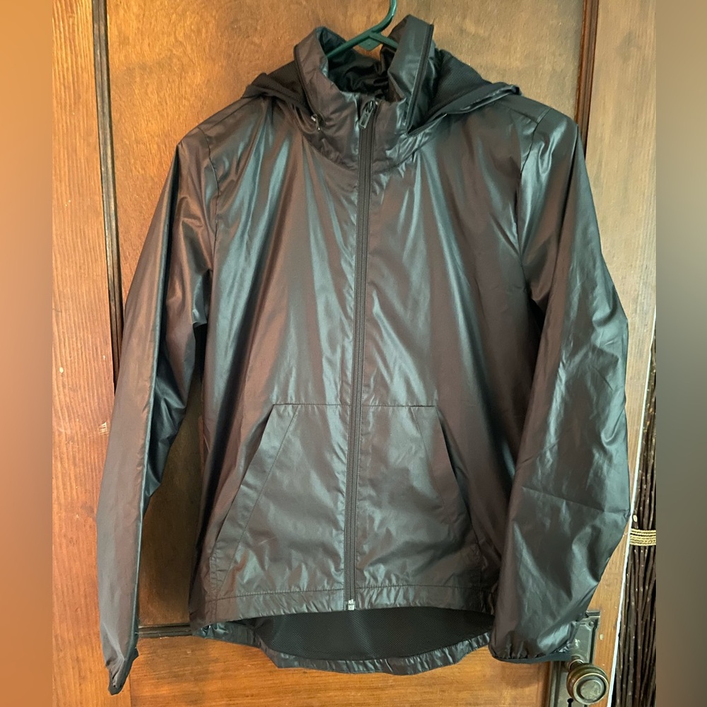 Adidas jacket. Light windbreaker with packable hood.
